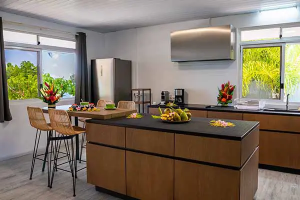 Modern kitchen with central island in our Bora Bora vacation home