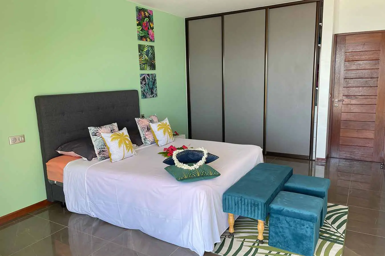 Comfortable double bed and wardrobe in our Bora Bora vacation home