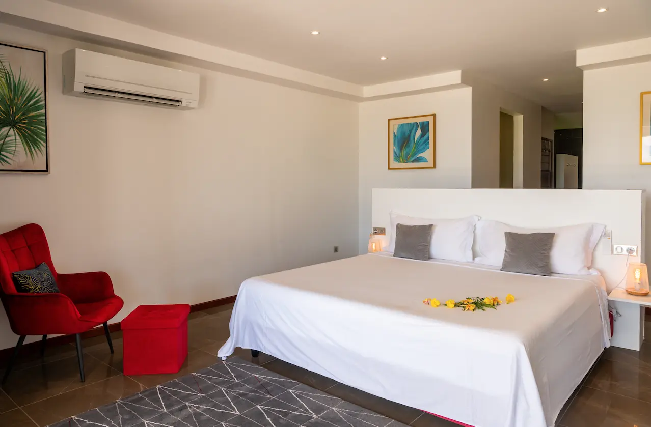 Comfortable double bed and wardrobe in our Bora Bora vacation home