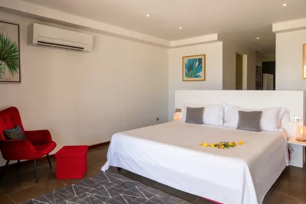 Comfortable double bed and wardrobe in our Bora Bora vacation home