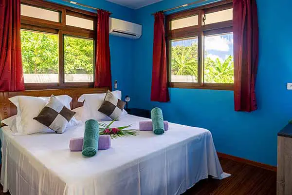 Comfortable bedroom with air-conditioned double bed in our Bora Bora vacation home
