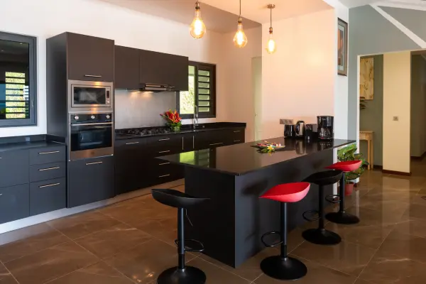 Modern kitchen with central island in our Bora Bora vacation home